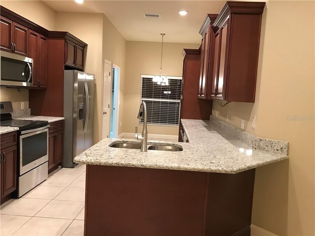 6805 Shimmering Dr - Photo 5 of 28