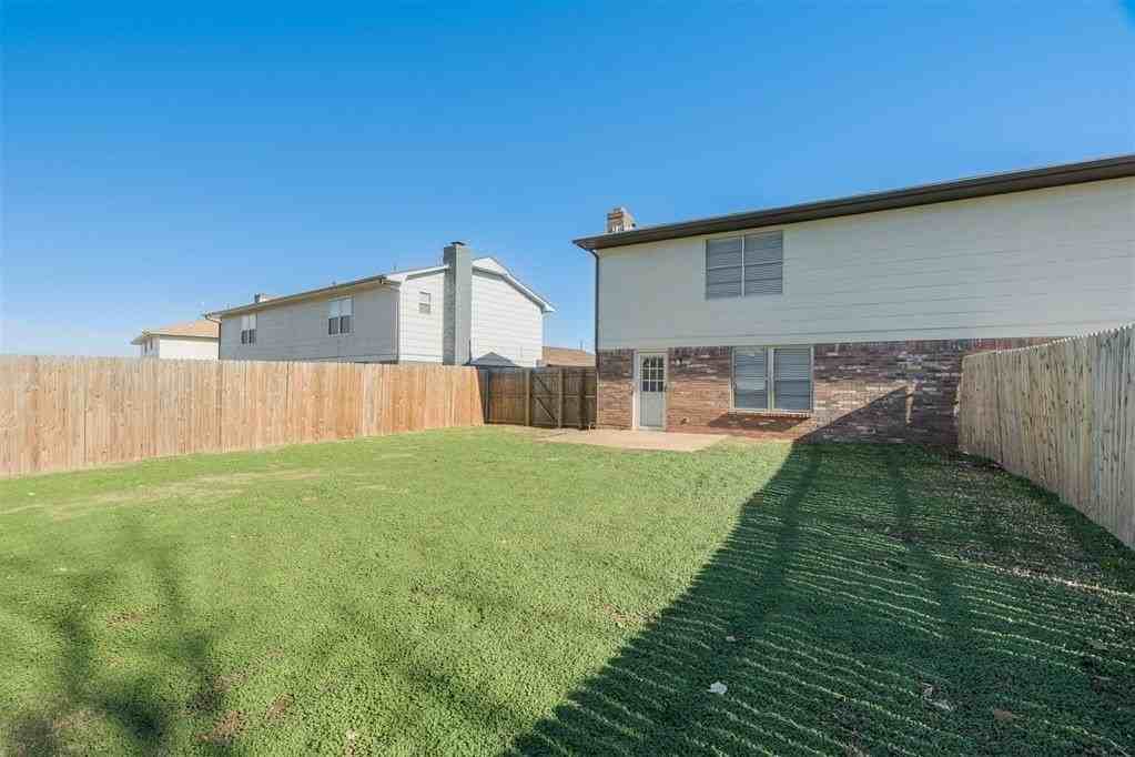 11715 N Francis Ave - Photo 6 of 27