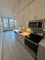 featured image of 126 E 6th St