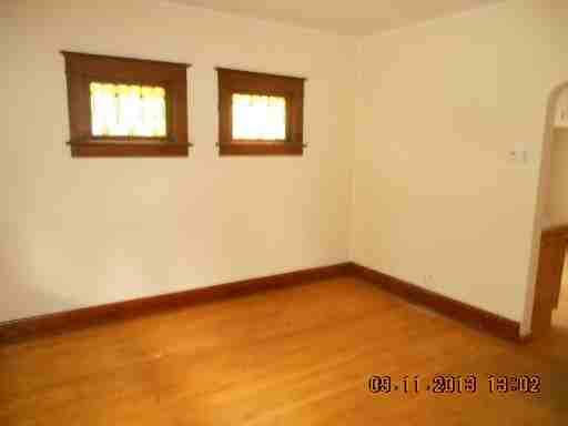 1329 W Rawson Ave - Photo 3 of 5