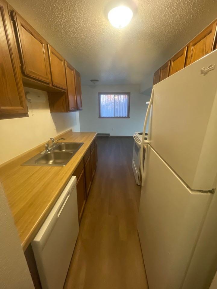 NP Apartments - Photo 2 of 15