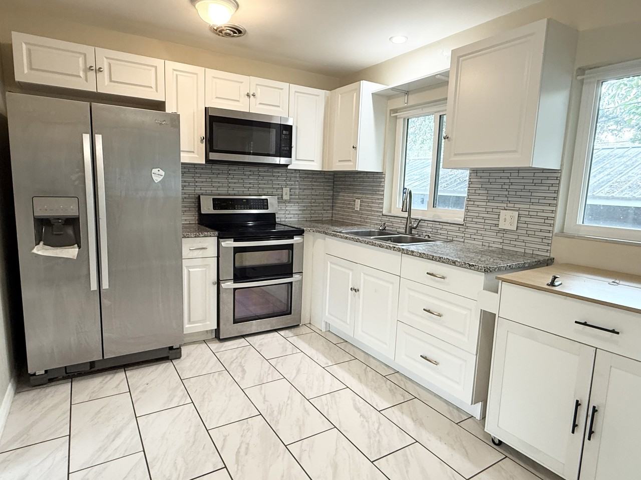 7181 49th Avenue North - Main House #MAIN - Photo 2 of 10