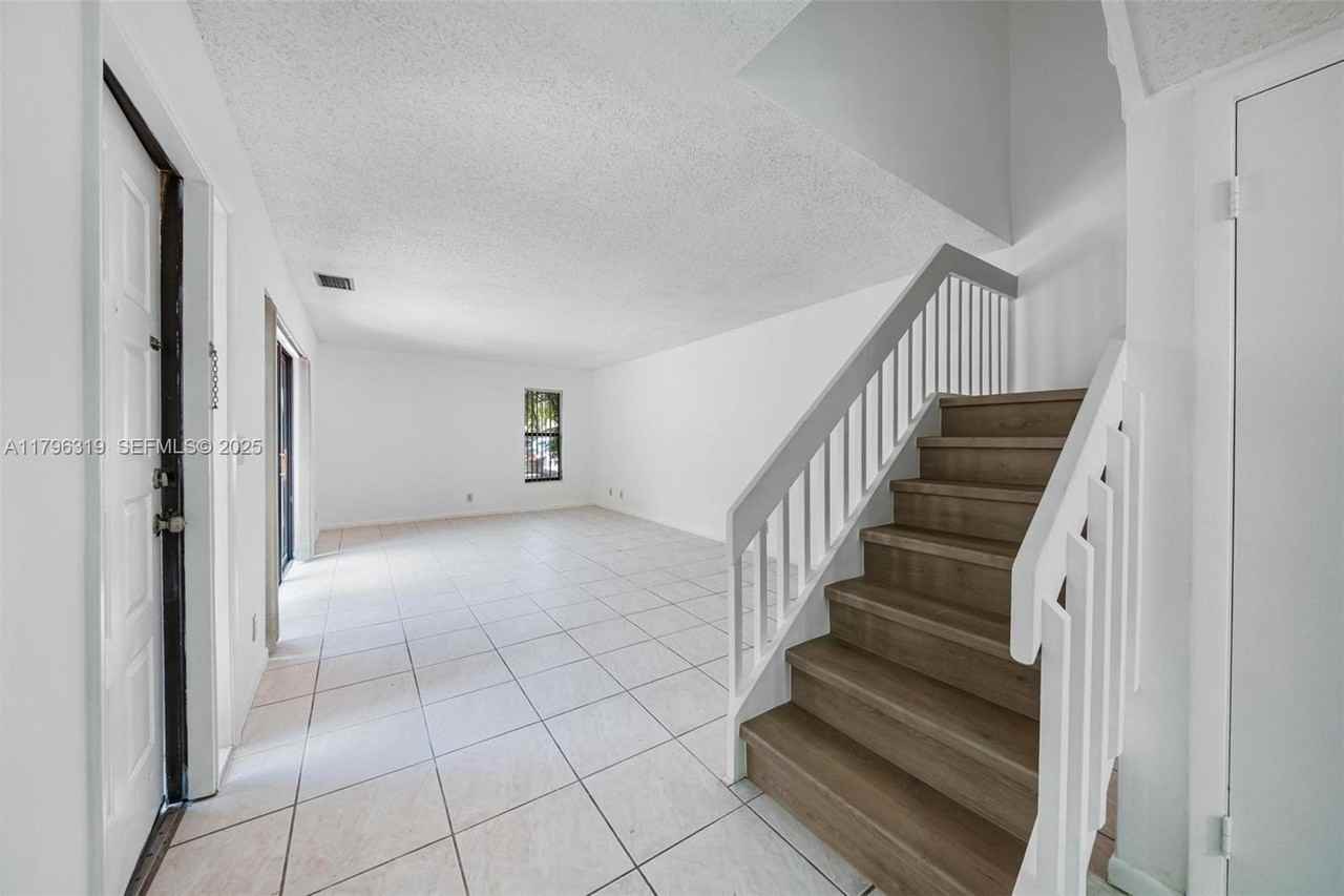 3199 Cocoplum Circle - Photo 3 of 32