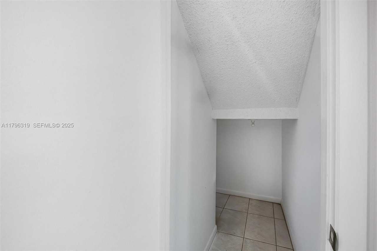 3199 Cocoplum Circle - Photo 4 of 32