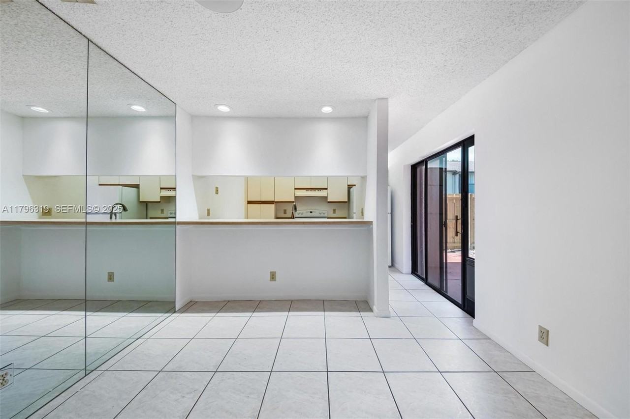 3199 Cocoplum Circle - Photo 7 of 32