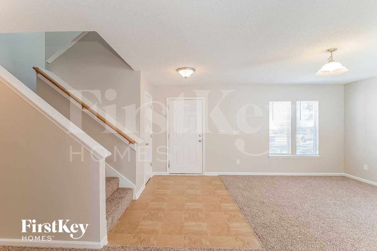 1479 Dunns Lake Dr E - Photo 2 of 15