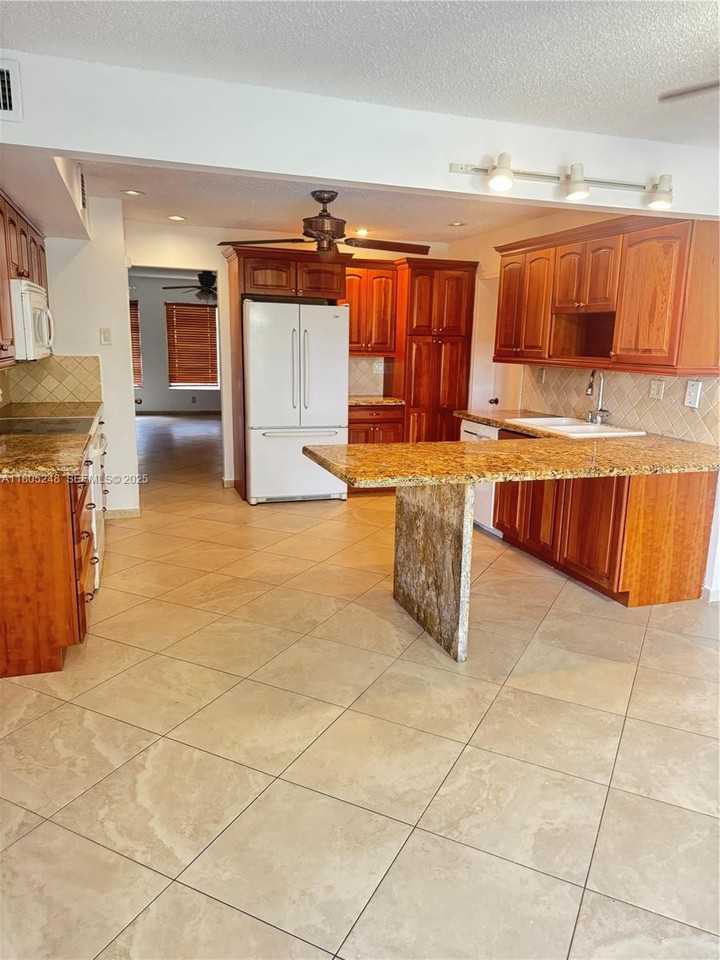 3111 Coral Springs Drive ##215 - Photo 4 of 22