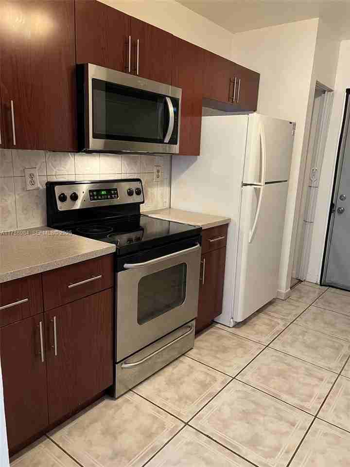 1320 Northeast 117th Terrace ##2 - Photo 2 of 8