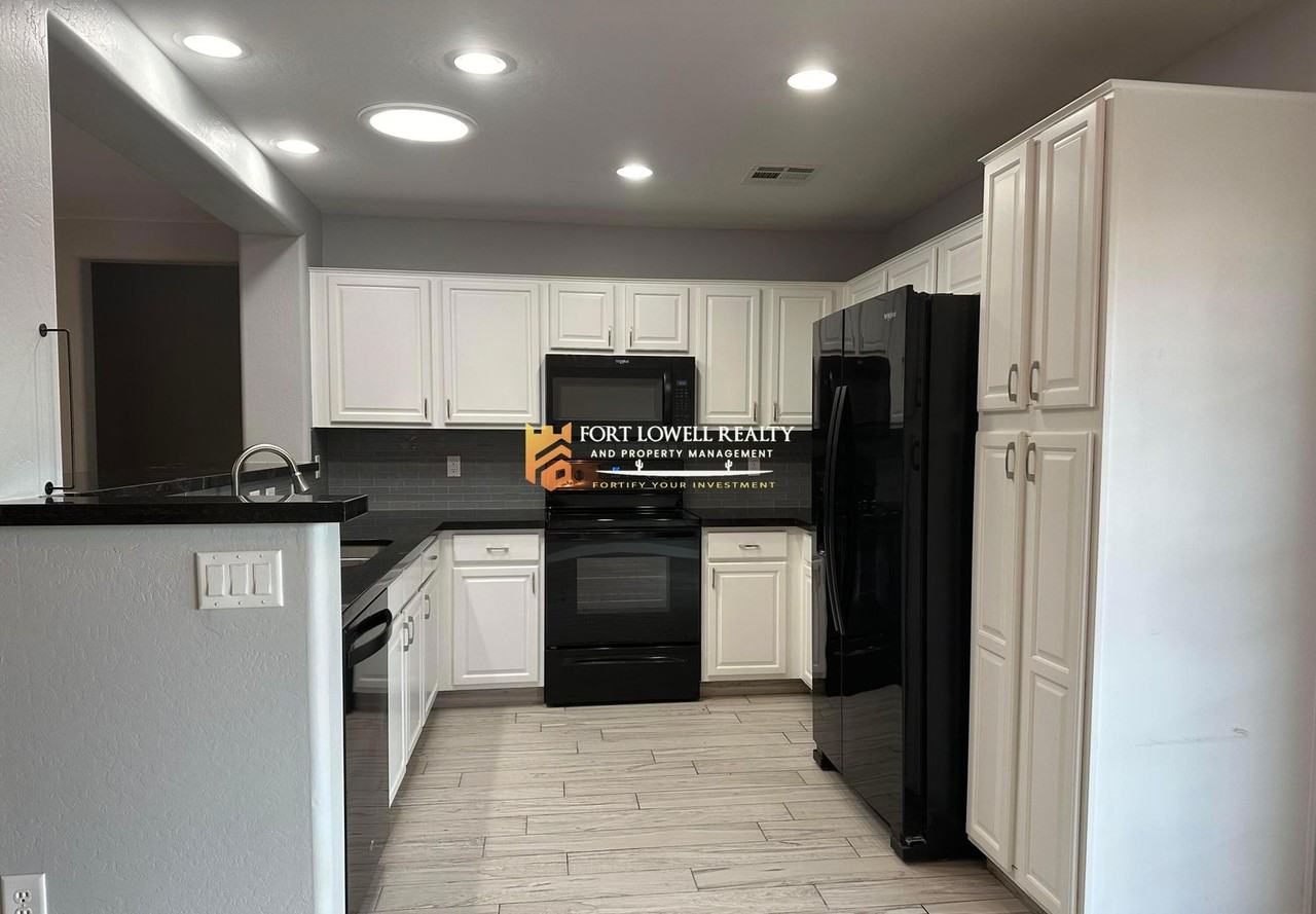 1401 S 228th Ln - Photo 3 of 16