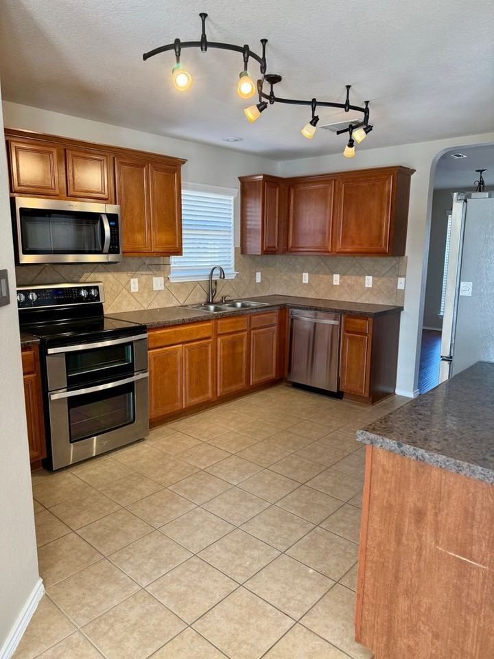 5704 Drystone Ln - Photo 3 of 22