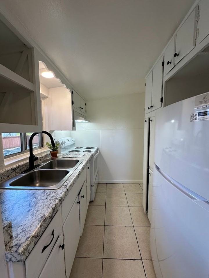 13602 Trinity Ave #13602 - Photo 7 of 50