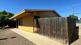 Central (Grant and  Dodge) single story apartment complex, a/cs, private fenced yards and laundry on site! - Photo 1 of 1