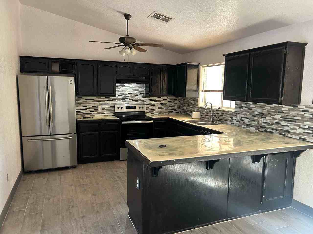 14817 E 49th St - Photo 3 of 7