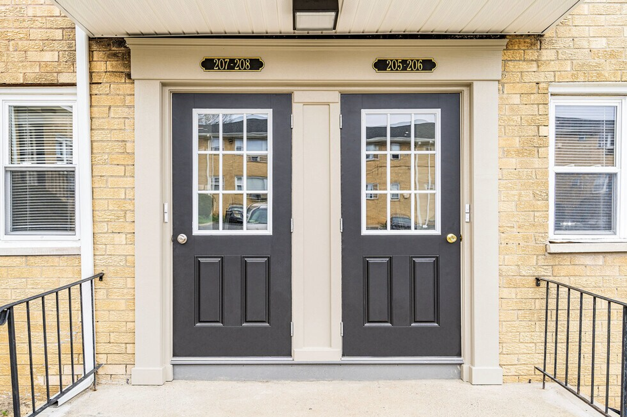 Village Arms Apartments - Photo 2 of 10