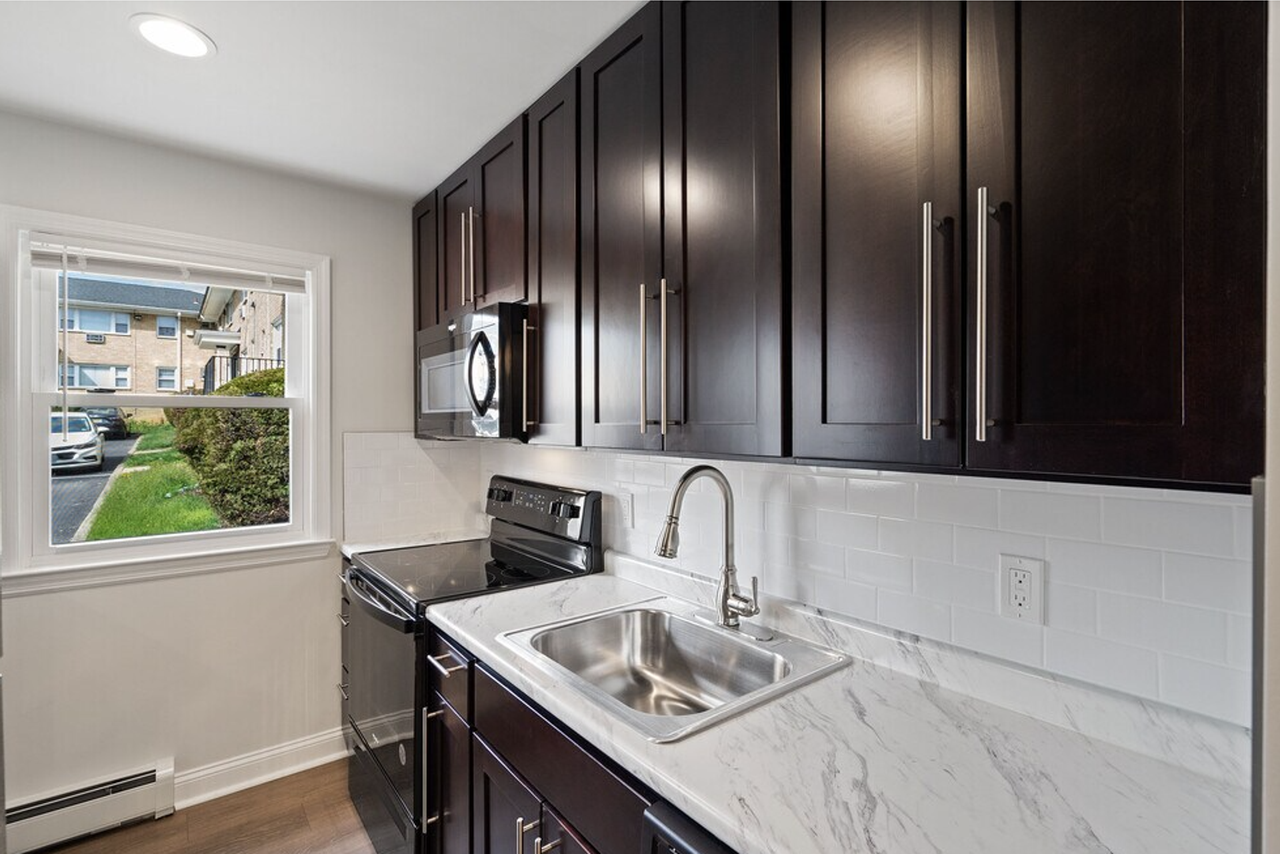 Village Arms Apartments - Photo 5 of 10