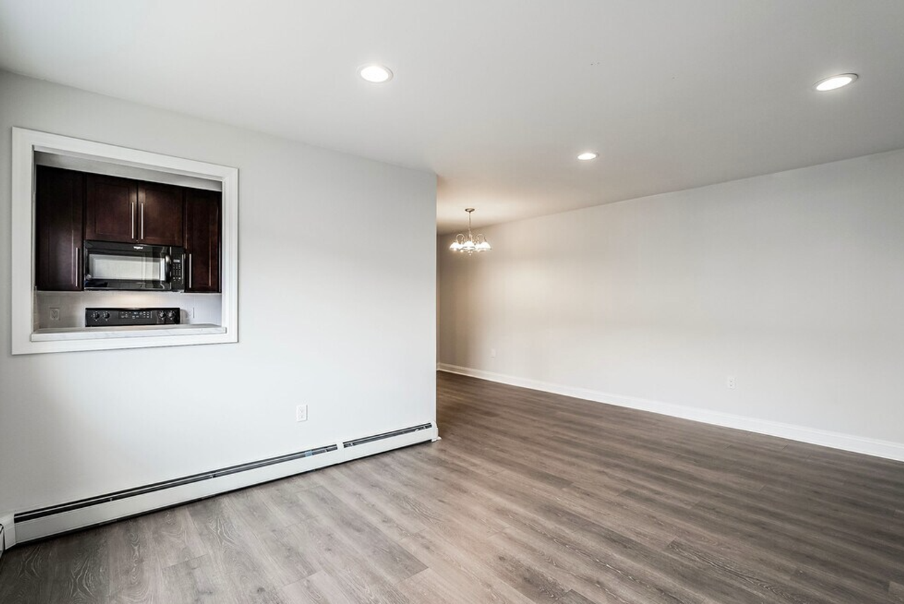 Village Arms Apartments - Photo 6 of 10