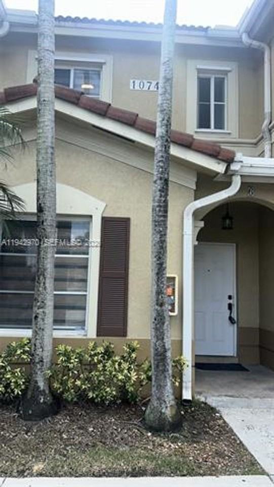 10740 10740 NW 83 St th 6-11 #11 - Photo 2 of 49