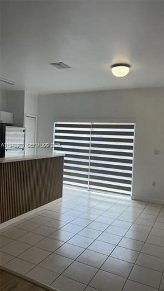 10740 10740 NW 83 St th 6-11 #11 - Photo 4 of 49