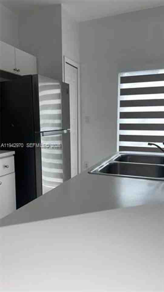 10740 10740 NW 83 St th 6-11 #11 - Photo 7 of 49