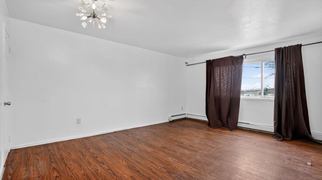 1102 E 233rd St - Photo 4 of 30