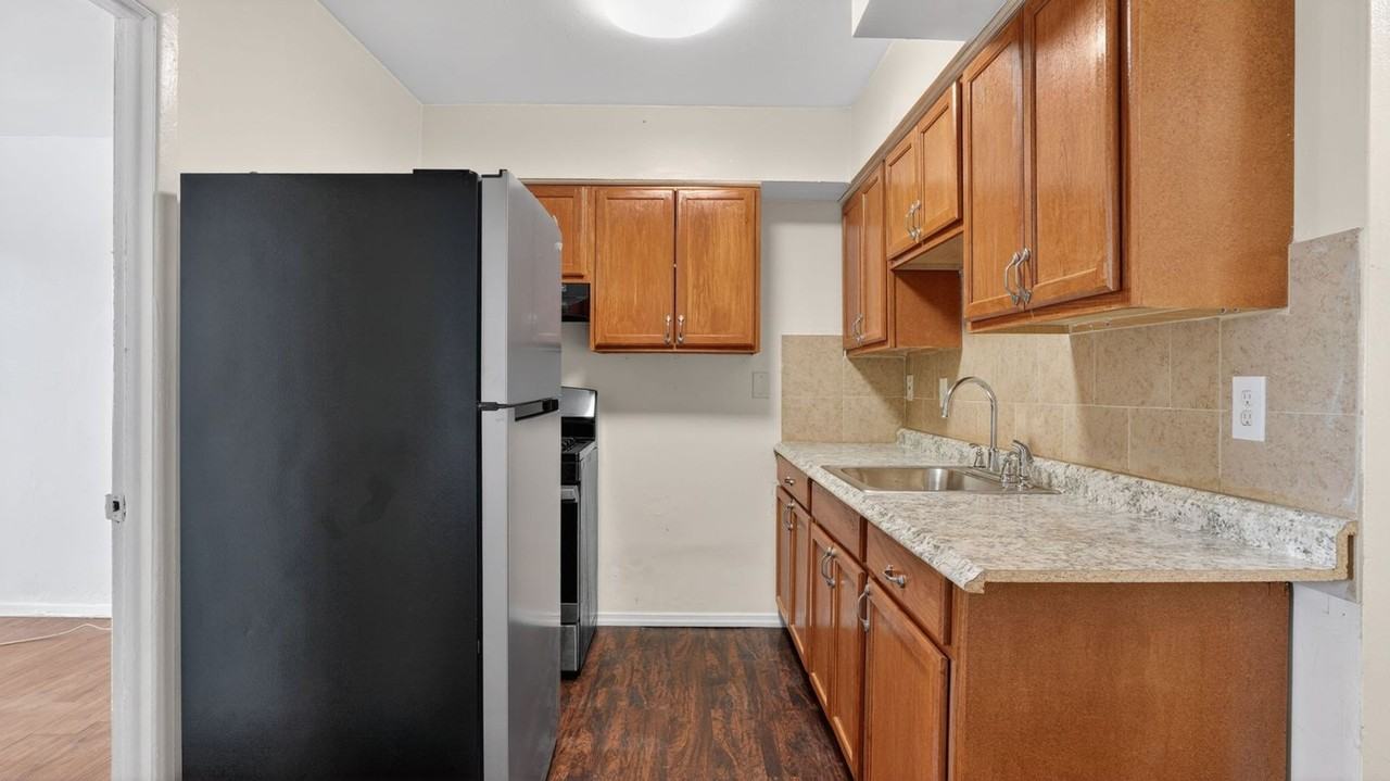 1102 E 233rd St - Photo 5 of 30