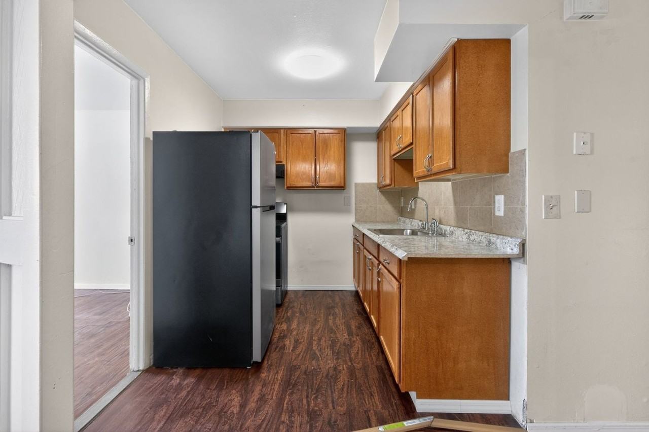 1102 E 233rd St - Photo 7 of 30