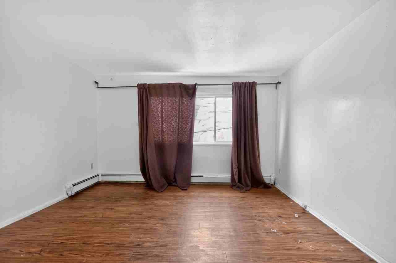 1102 E 233rd St - Photo 3 of 30