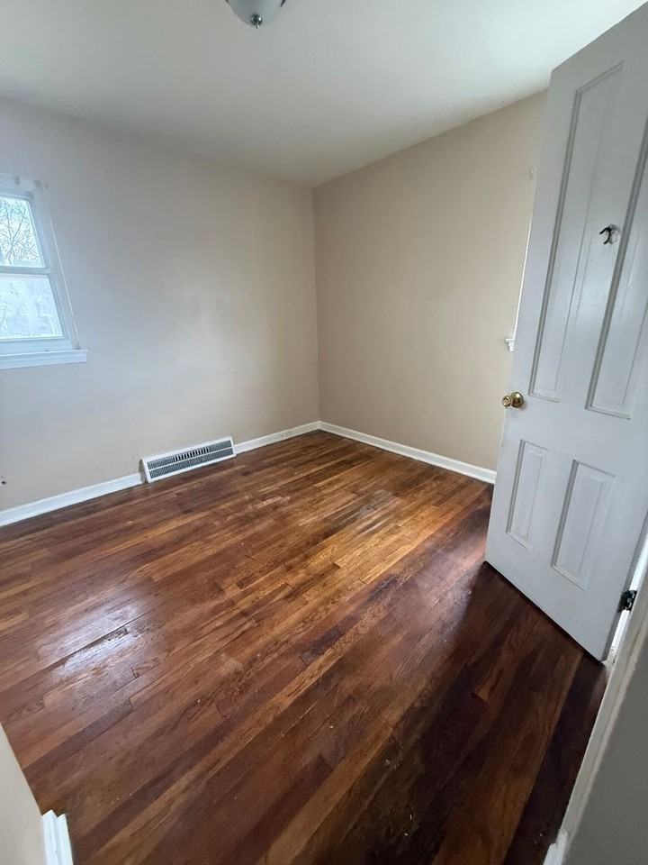 864 E 260th St - Photo 7 of 9