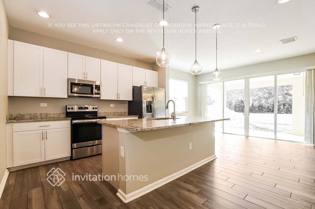 5672 Western Sun Dr - Photo 6 of 18