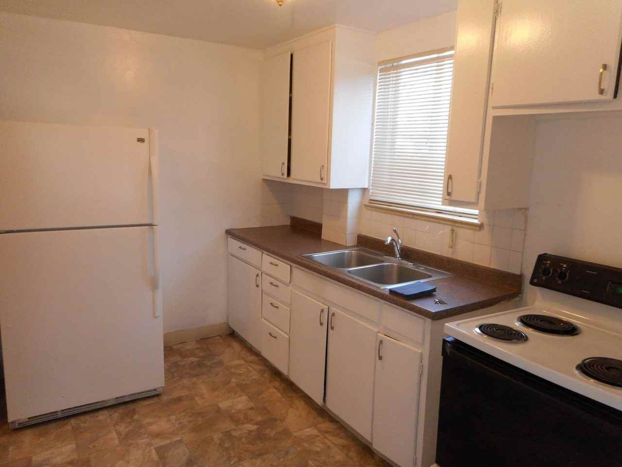 4217 S Acoma St - Photo 2 of 9