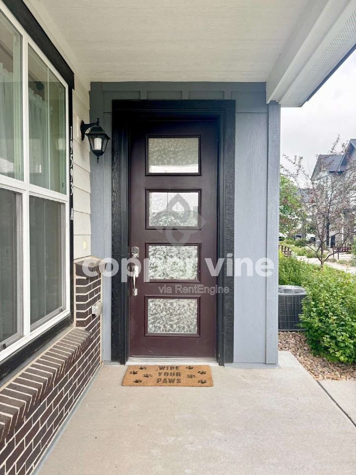 19593 W 93rd Ln #A - Photo 3 of 28