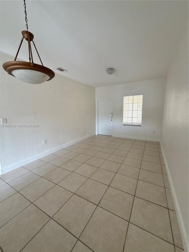 6912 Nw 179th St #106 - Photo 5 of 22
