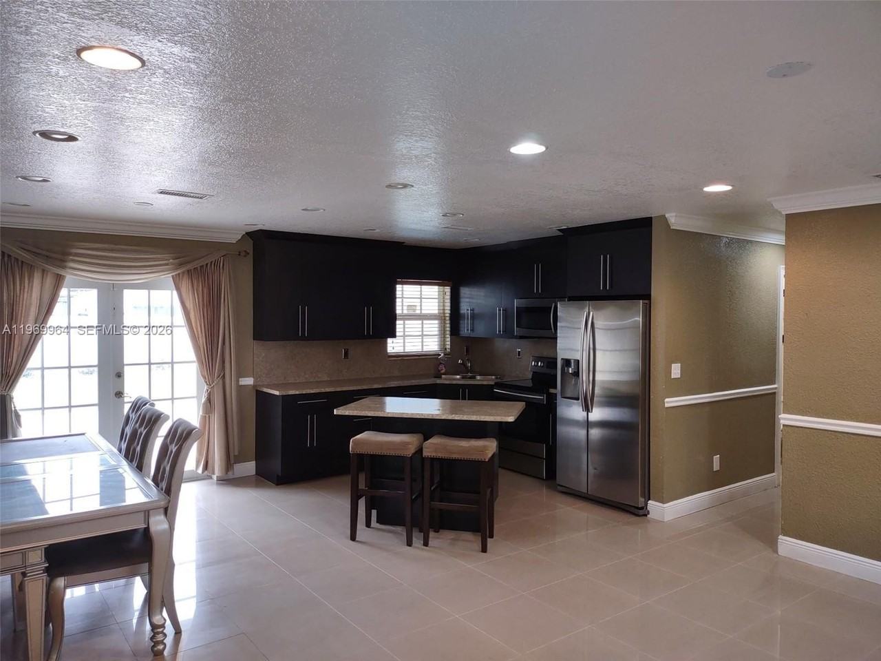 1241 Nw 174th St - Photo 3 of 12