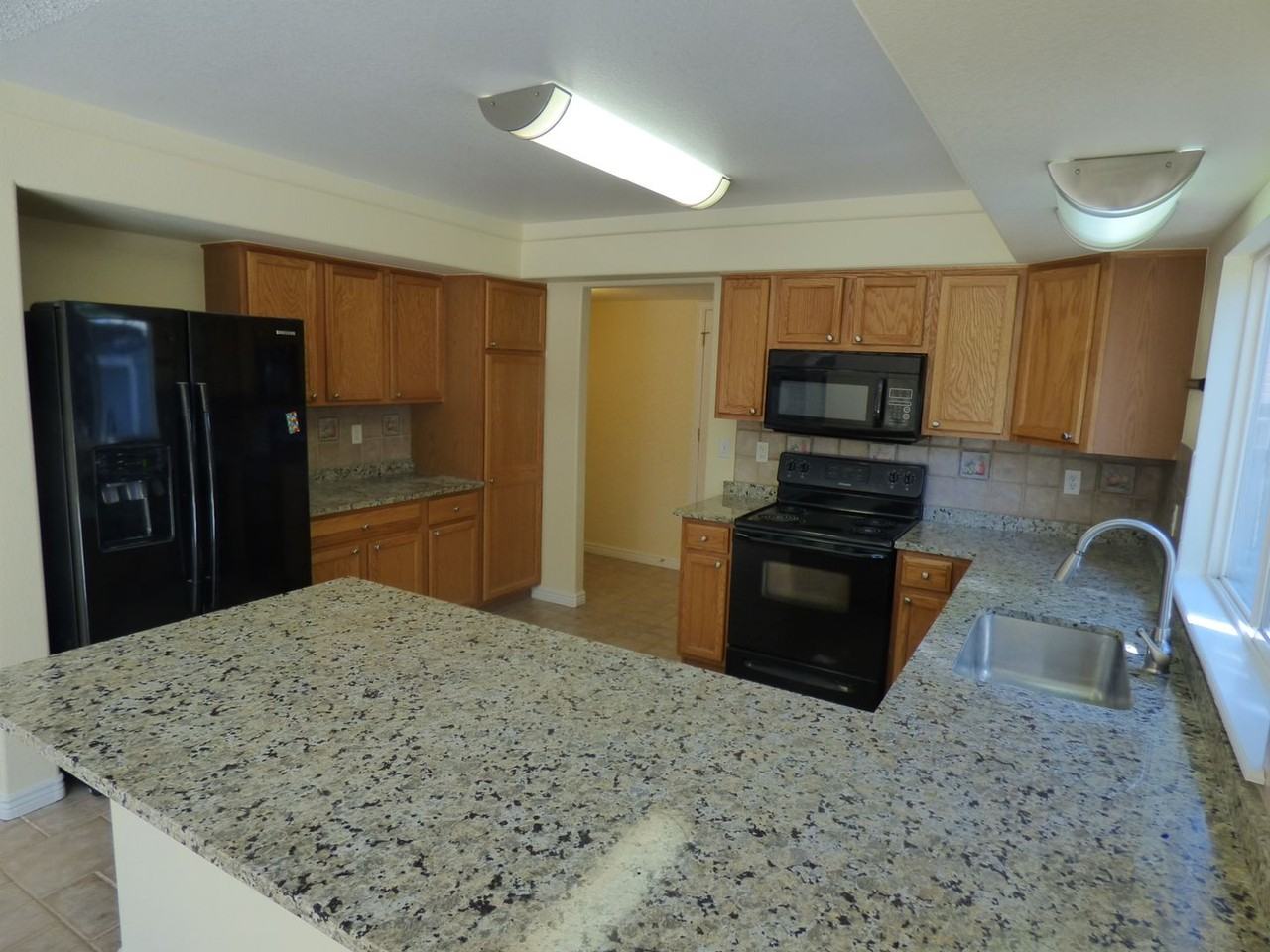 21534 E 40th Ave - Photo 3 of 35