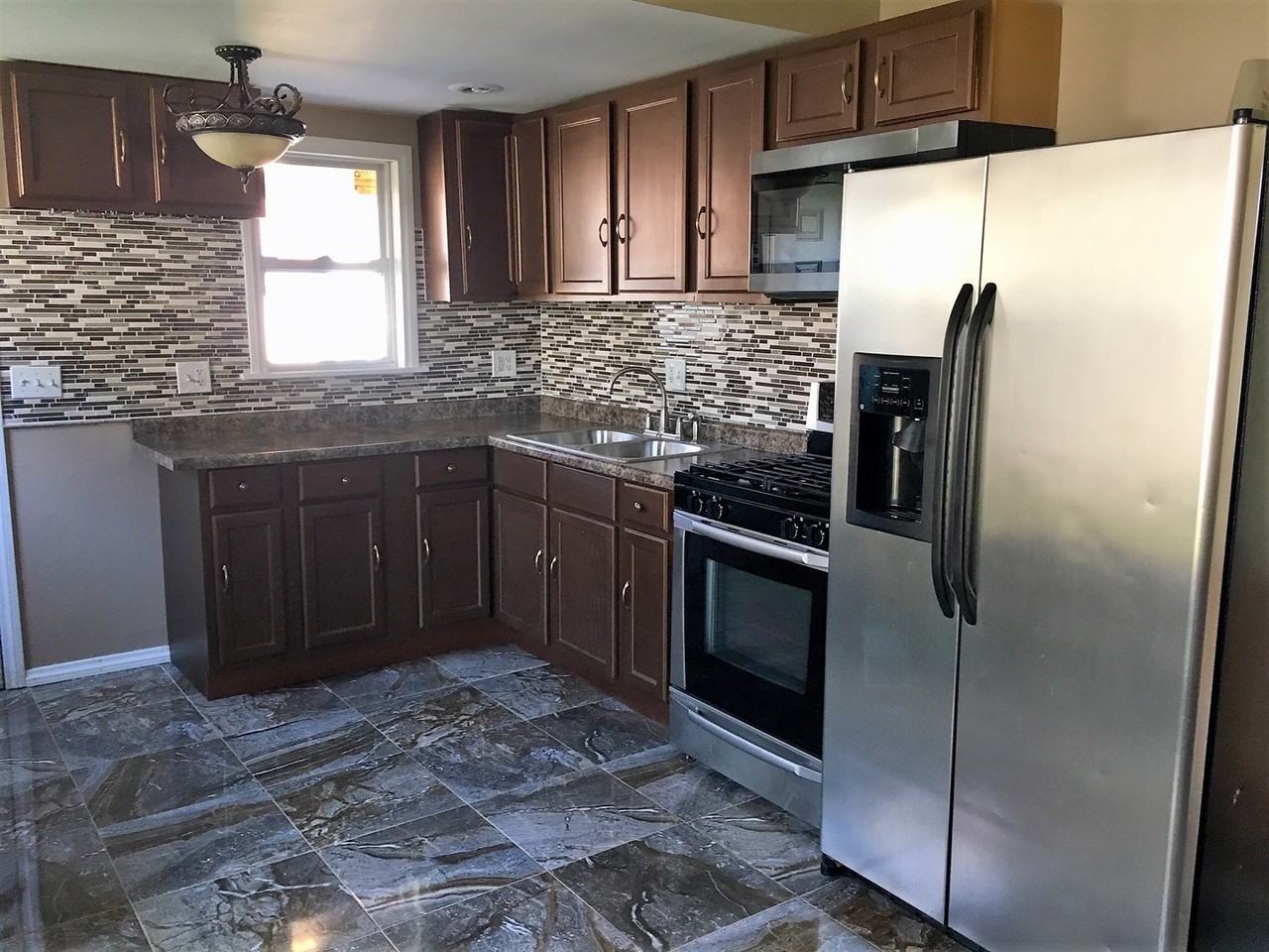 1101 Mcdonald Ave - Photo 3 of 15