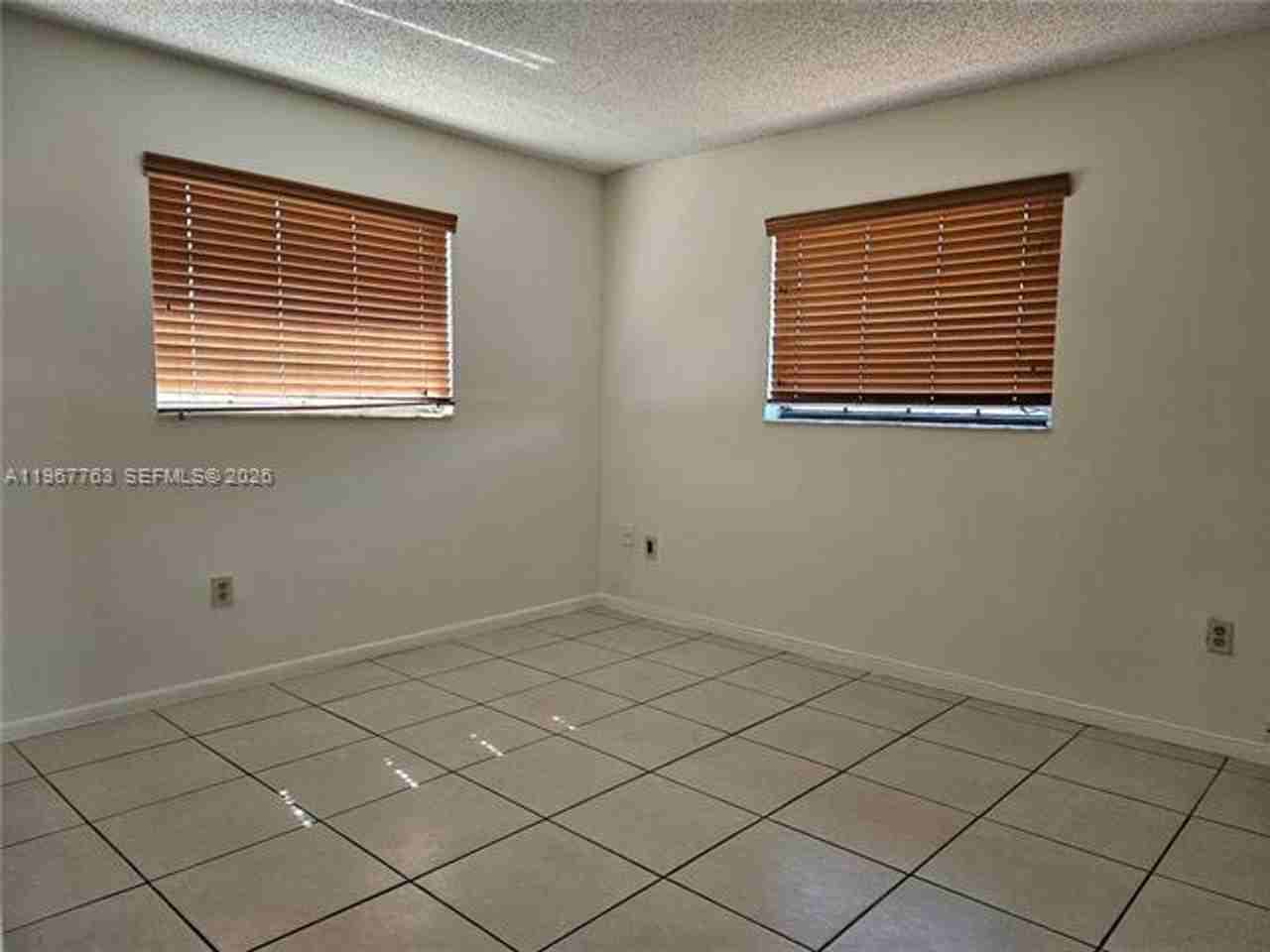 13220 13220 SW 58th Ter th 16-1 #1 - Photo 3 of 11