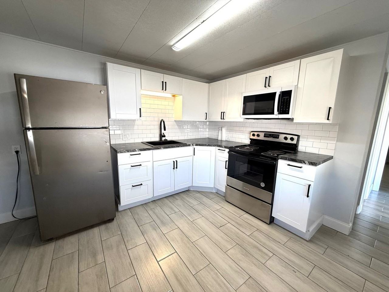 1112 50th Avenue Dr W - Photo 3 of 11