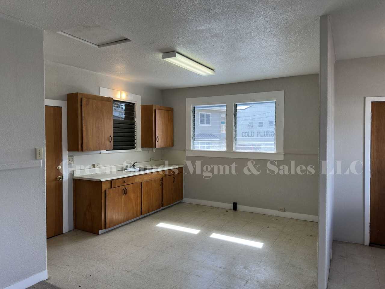 597 Kinoole St - Photo 3 of 14