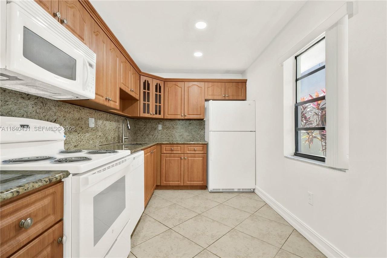 8287 Southwest 128th Street #108 - Photo 2 of 32