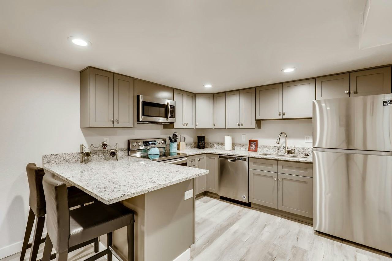 9875 East 22nd Avenue, Unit B (Basement Suite) - Photo 3 of 19