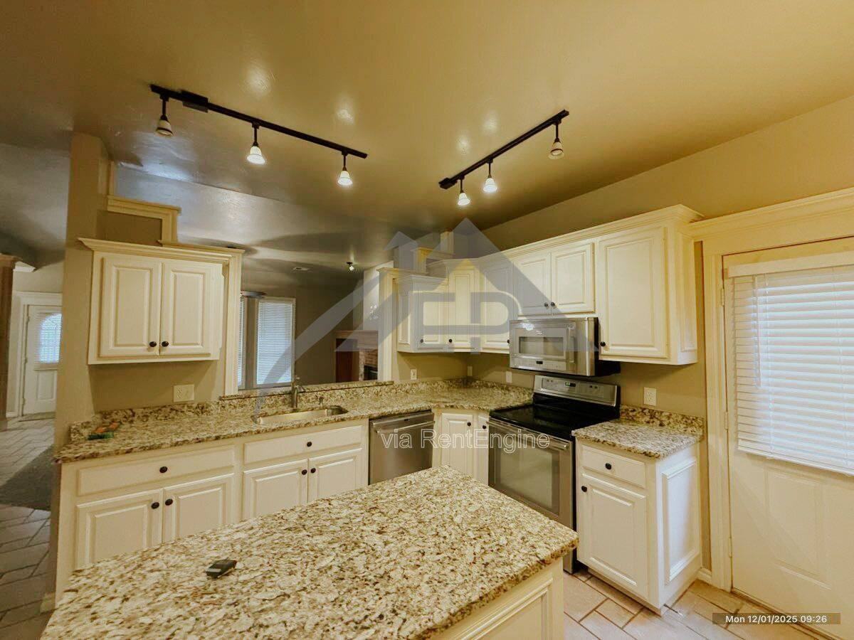 14001 Arapaho Rd - Photo 5 of 8