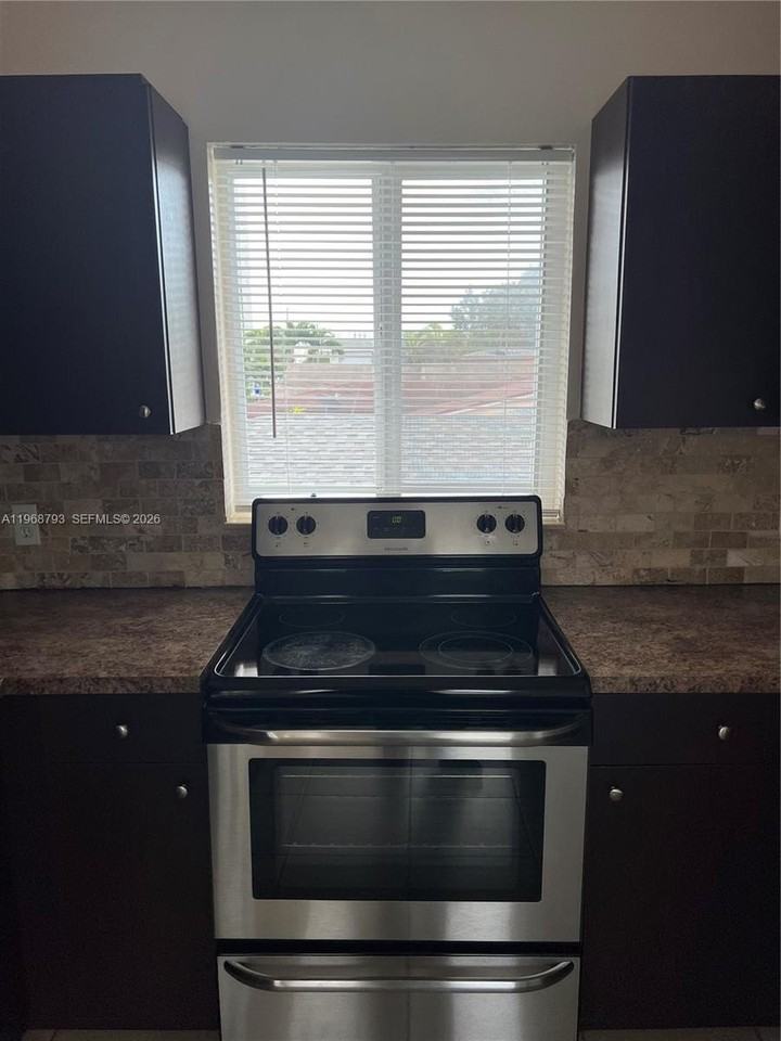 890 Nw 22nd Ct #890 - Photo 4 of 8