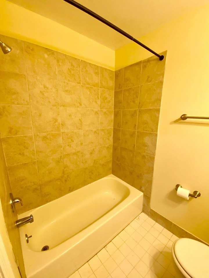 For Rent: Classic Charm at 5009 Roland Ave – Your Urban Sanctuary Awaits! - Photo 3 of 10