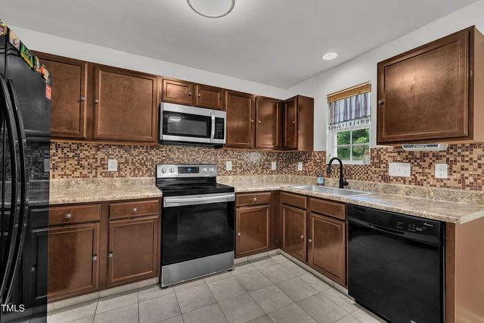 2816 Erinridge Rd - Photo 2 of 12