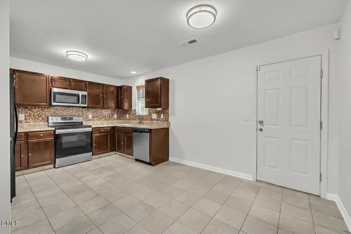 2816 Erinridge Rd - Photo 4 of 12