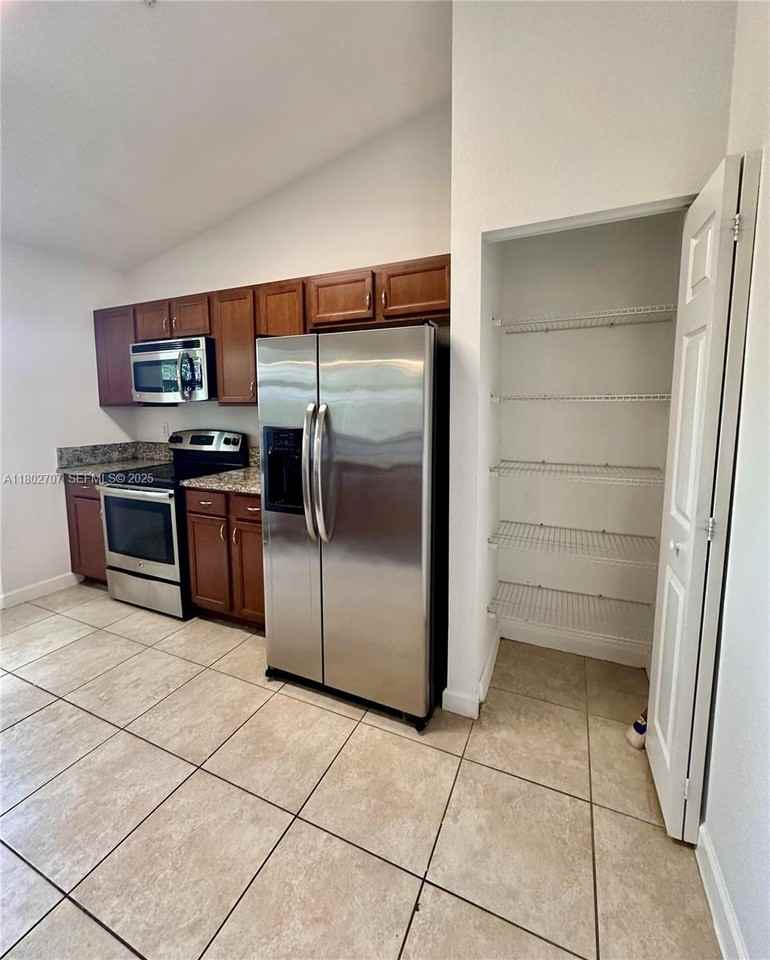 22561 Southwest 88th Place #301 - Photo 2 of 27