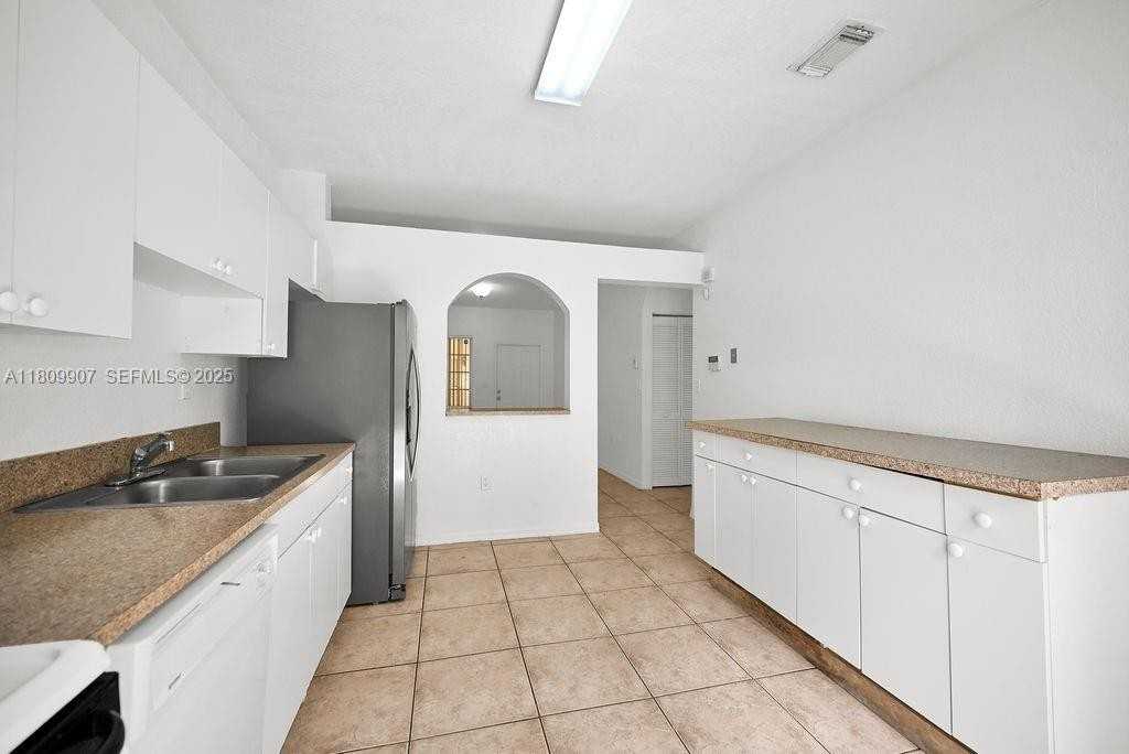 6900 Northwest 179th Street #104 - Photo 3 of 31