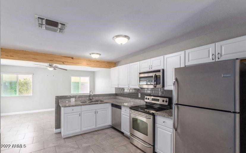 7127 W Vermont Ave - Photo 3 of 8