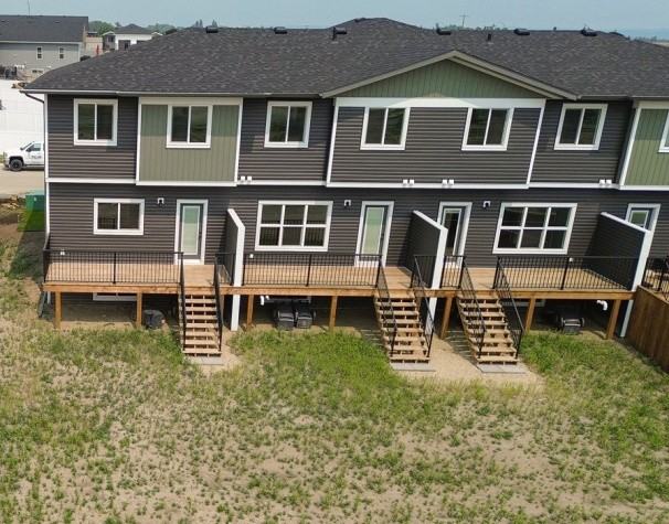 Brand New Townhouses Available in Sylvan Lake!!   Incentives Available - Photo 3 of 26