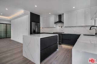 9345 W Olympic Blvd - Photo 5 of 8